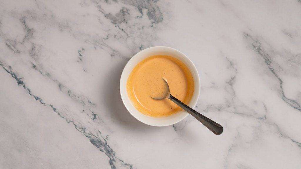 Spicy mayo in a small bowl