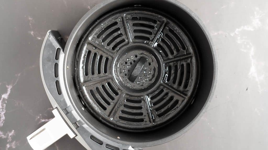 Greased air fryer basket