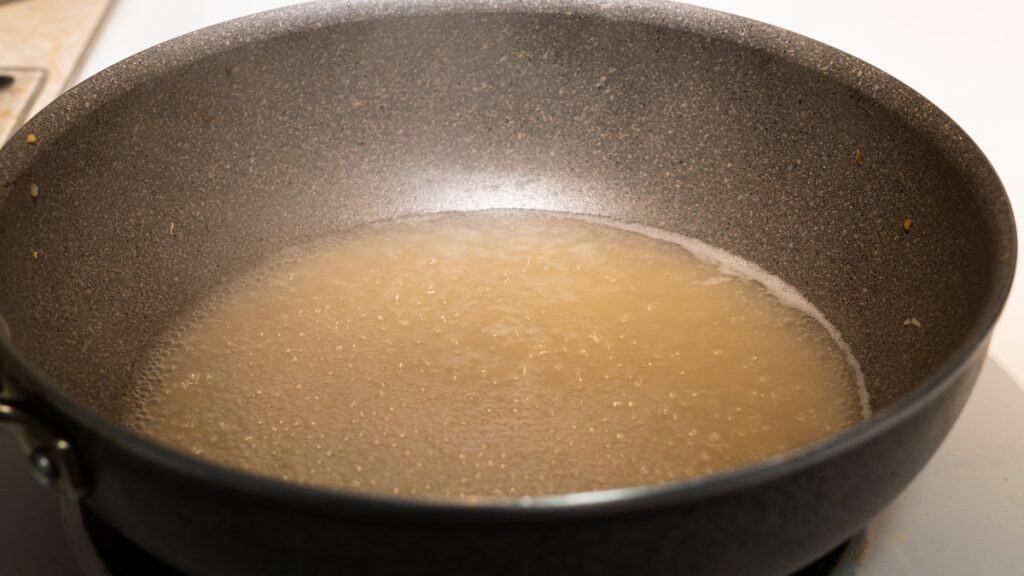 Boiling chicken broth