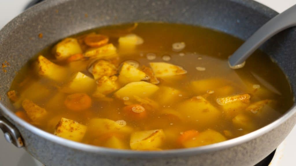 Simmering Japanese curry with potatoes and carrots