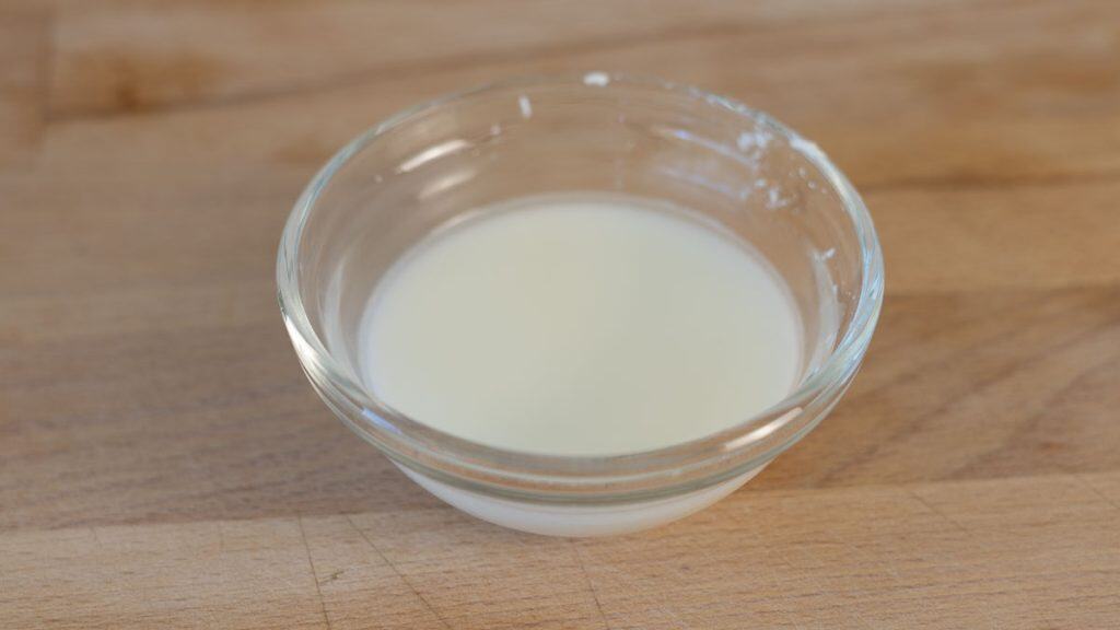 Cornstarch slurry in a glass bowl