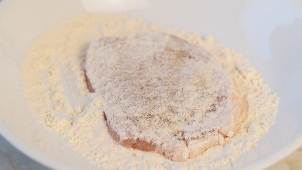 Pork chops dusted in flour