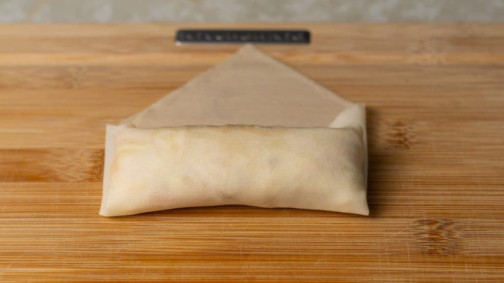Spring roll being rolled up