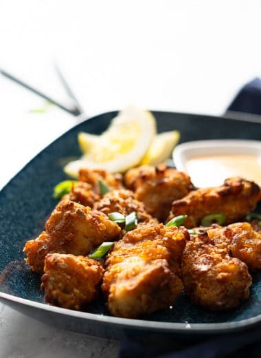 Air-fried karaage (Japanese fried chicken) with a lemon and sriracha mayo and green onions on top
