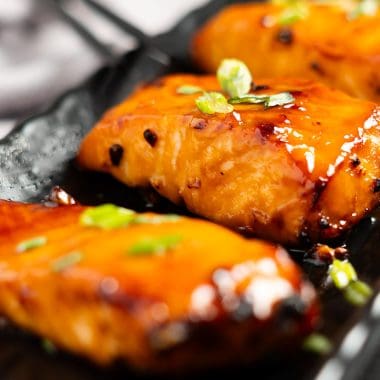 Air fried teriyaki salmon with green onions on top