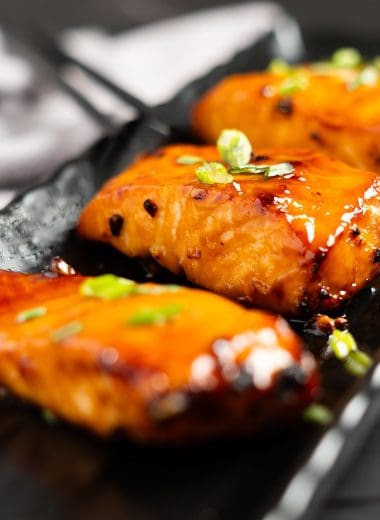 Air fried teriyaki salmon with green onions on top
