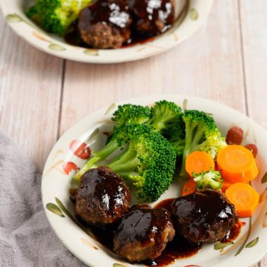 Japanese hamburg steak with sauce and broccoli and carrots