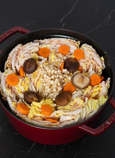 Mille Feuille Nabe with napa cabbage, shiitake mushrooms, carrots, and pork belly